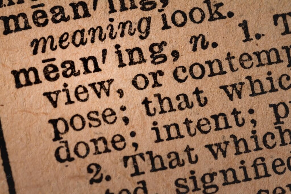 Premium Photo | Closeup of an Opened Dictionary showing the Word MEANING